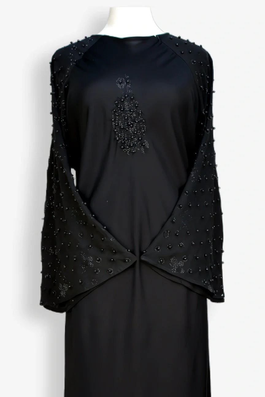 Close-up zoom showing 1600 moti hand work embellishment on black pearl abaya, stylish modest abaya design for women Pakistan
