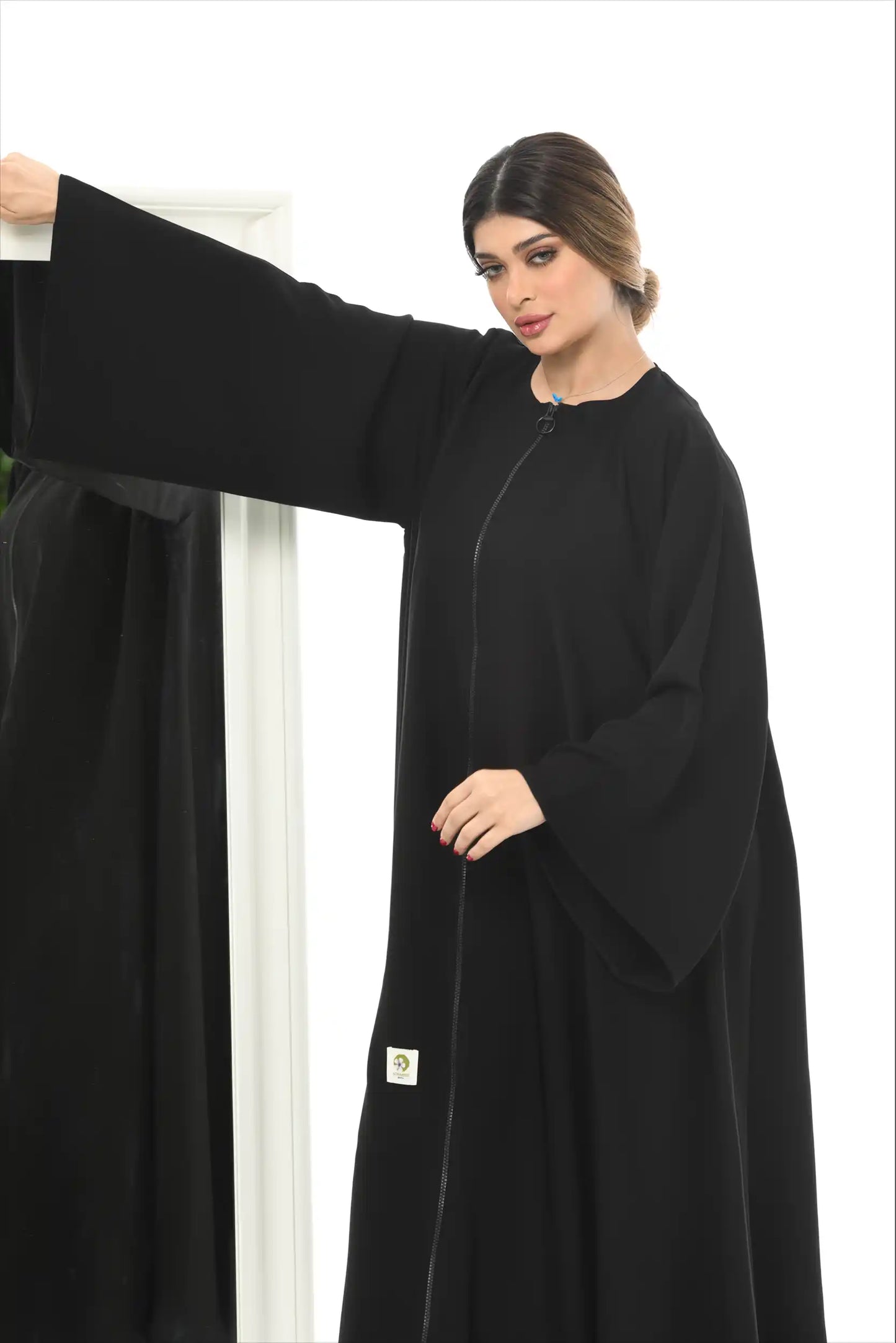 Side profile of Premium Arabic Style Full Zipper Abaya showcasing modest fit and graceful drape in nida fabric.