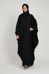 Full front view of black kaftan abaya with elasticated cuffs, elegant modest wear abaya for women in Pakistan