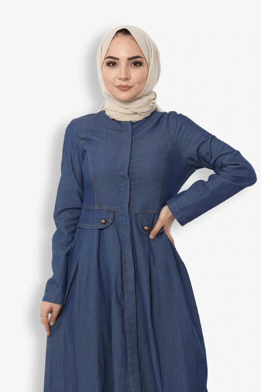 Close-up zoom view of fabric texture and button design on blue denim jeans abaya, modern modest abaya for women, online shopping Pakistan