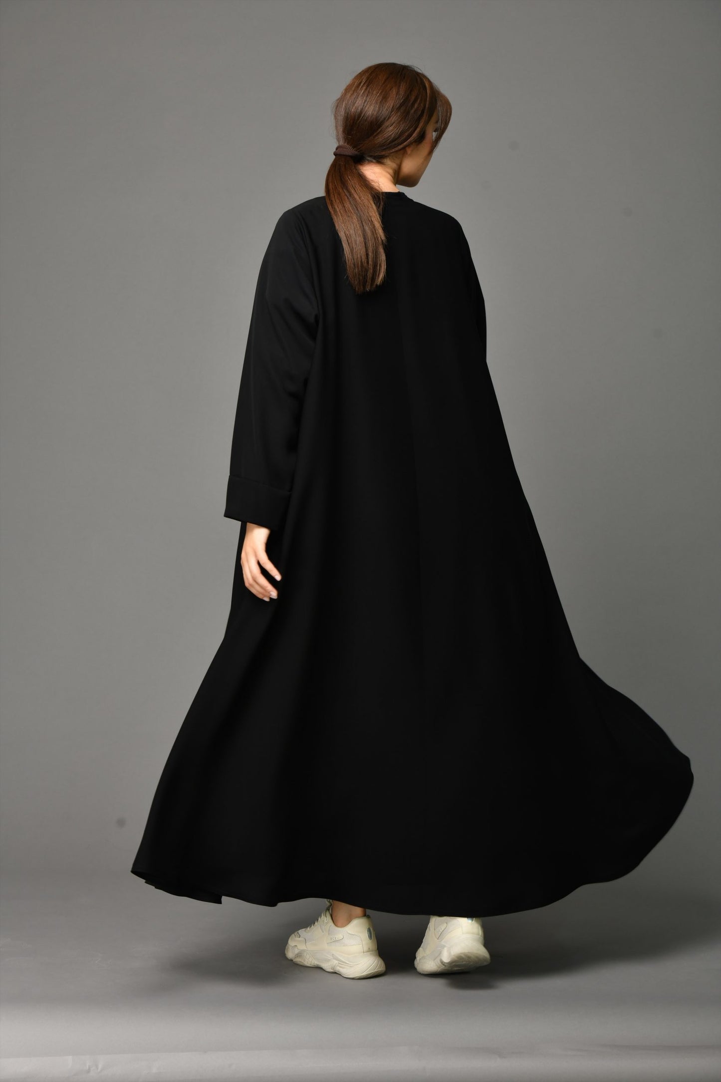 Full backside view of Arabic Style Abaya with front close zipper design, crafted from premium nida fabric.