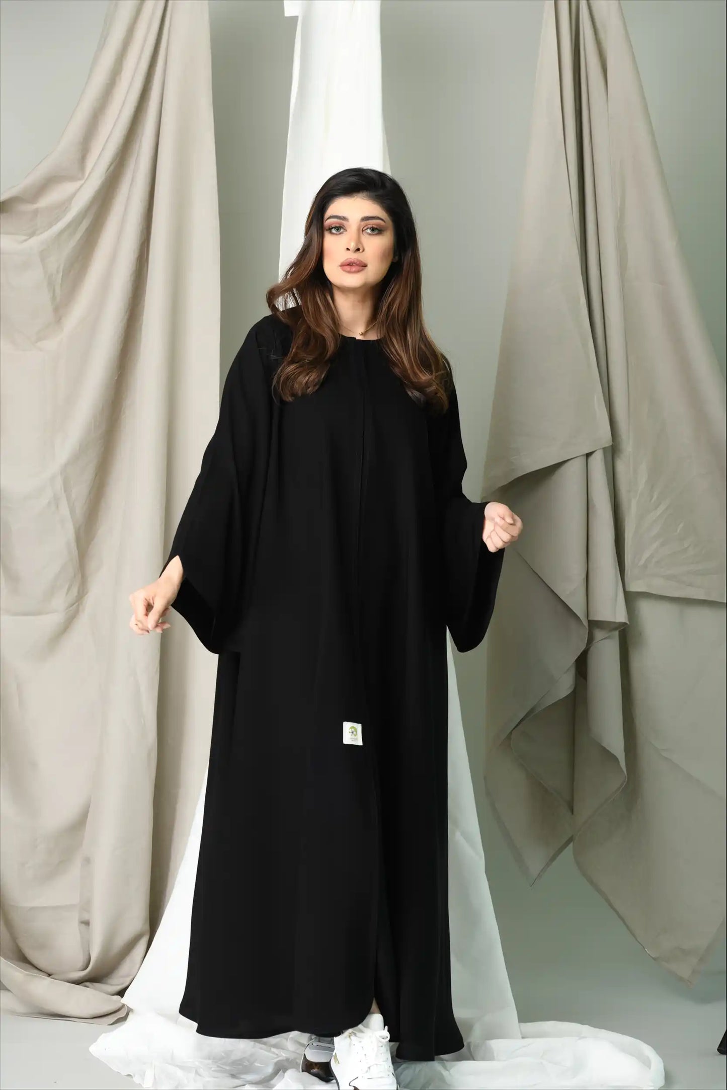 Front view of Premium Closh Cut Practical Abaya with front close design and optional full layer showcasing modest elegance for women.