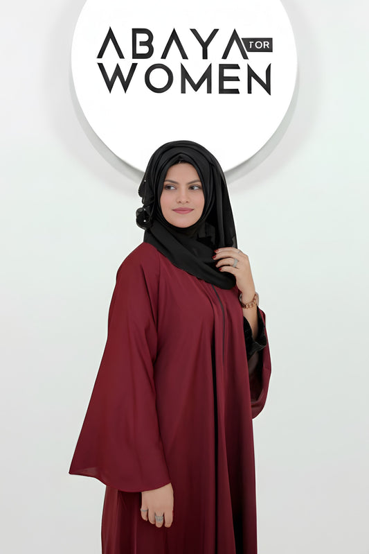 Zoomed view of front zipper and collar detail on maroon front open abaya for women