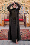 Zoomed-in view of dark green abaya fabric and zip design.