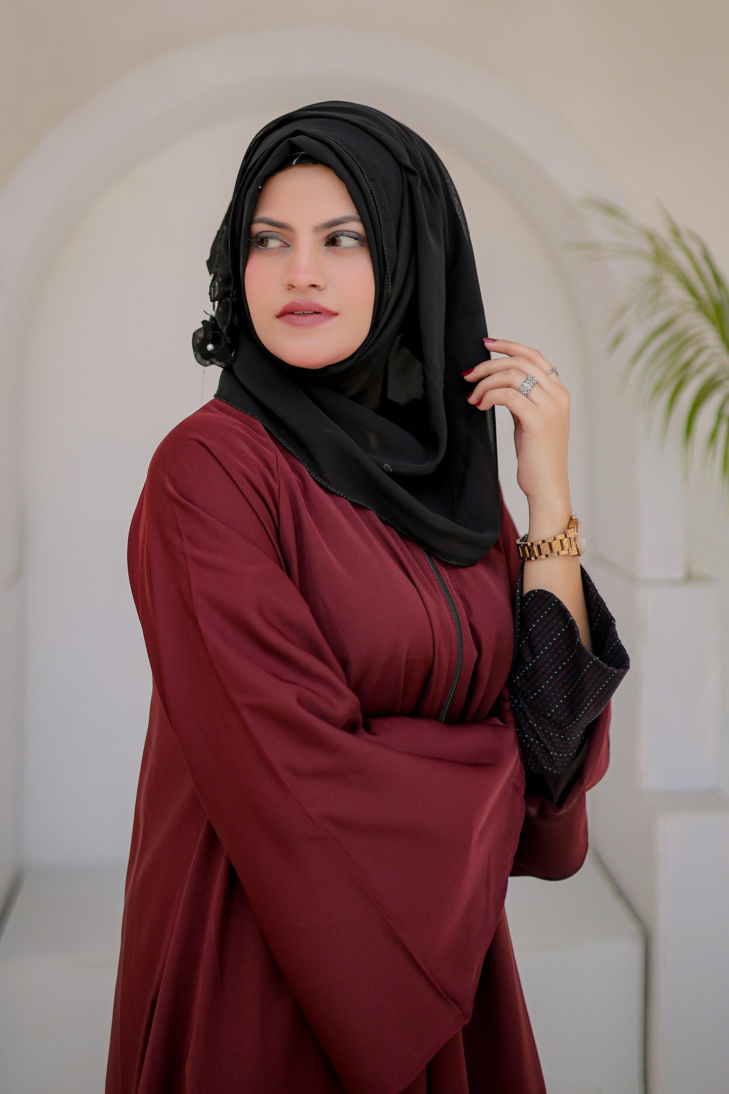 Close-up of Front Open Zipper Abaya in Maroon color highlighting zipper closure, fabric texture, and fine stitching details