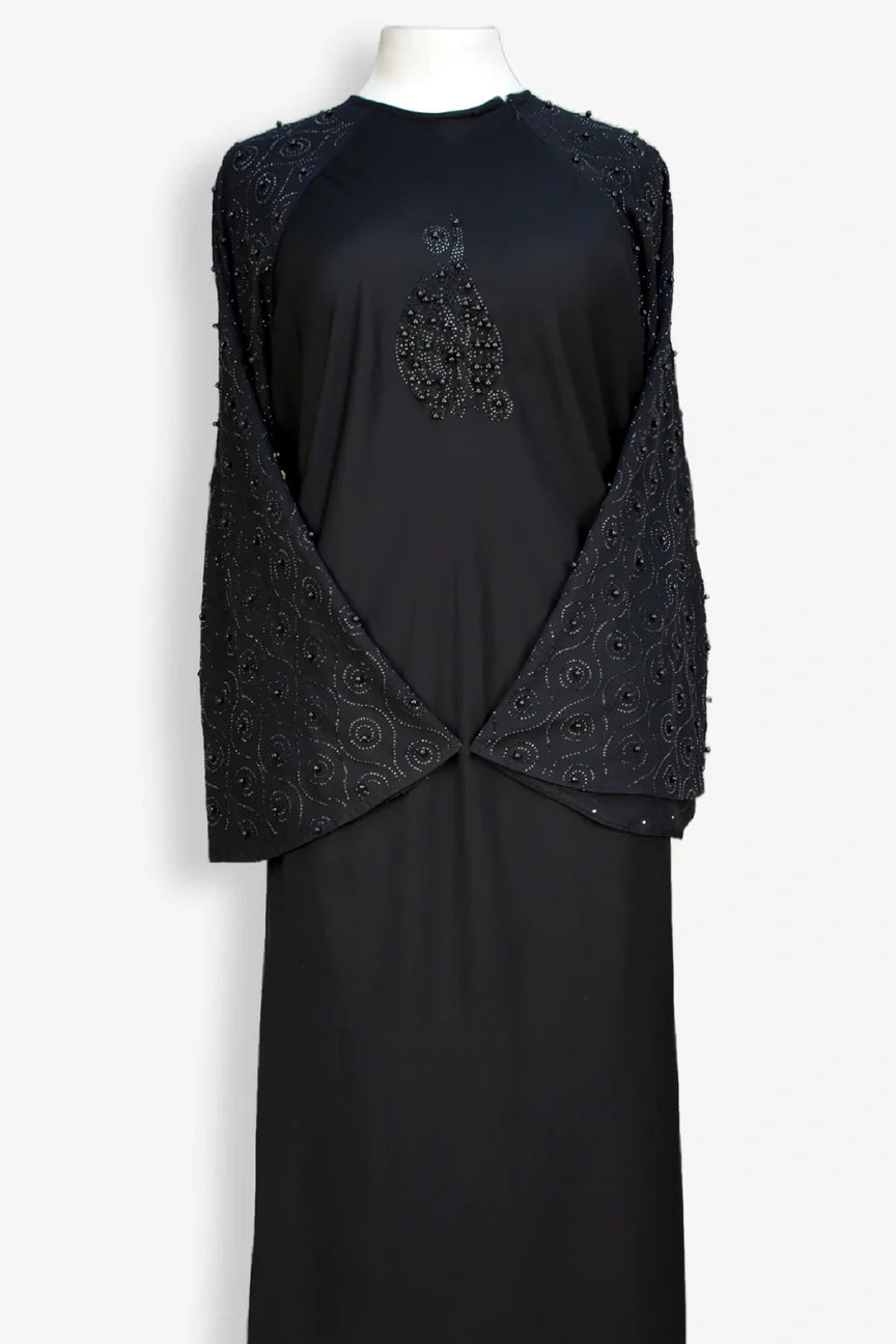 Close-up zoom of pearl sleeve embellishment with 800 moti work on black abaya, stylish modest abaya design for women, online shopping Pakistan