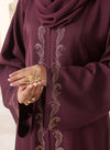 Front zoom view highlighting premium imported Nida fabric and stone work on elegant abaya for women