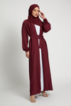 Full front view of elegant red kimono abaya with white belt and elasticated cuffs, stylish modest abaya for women