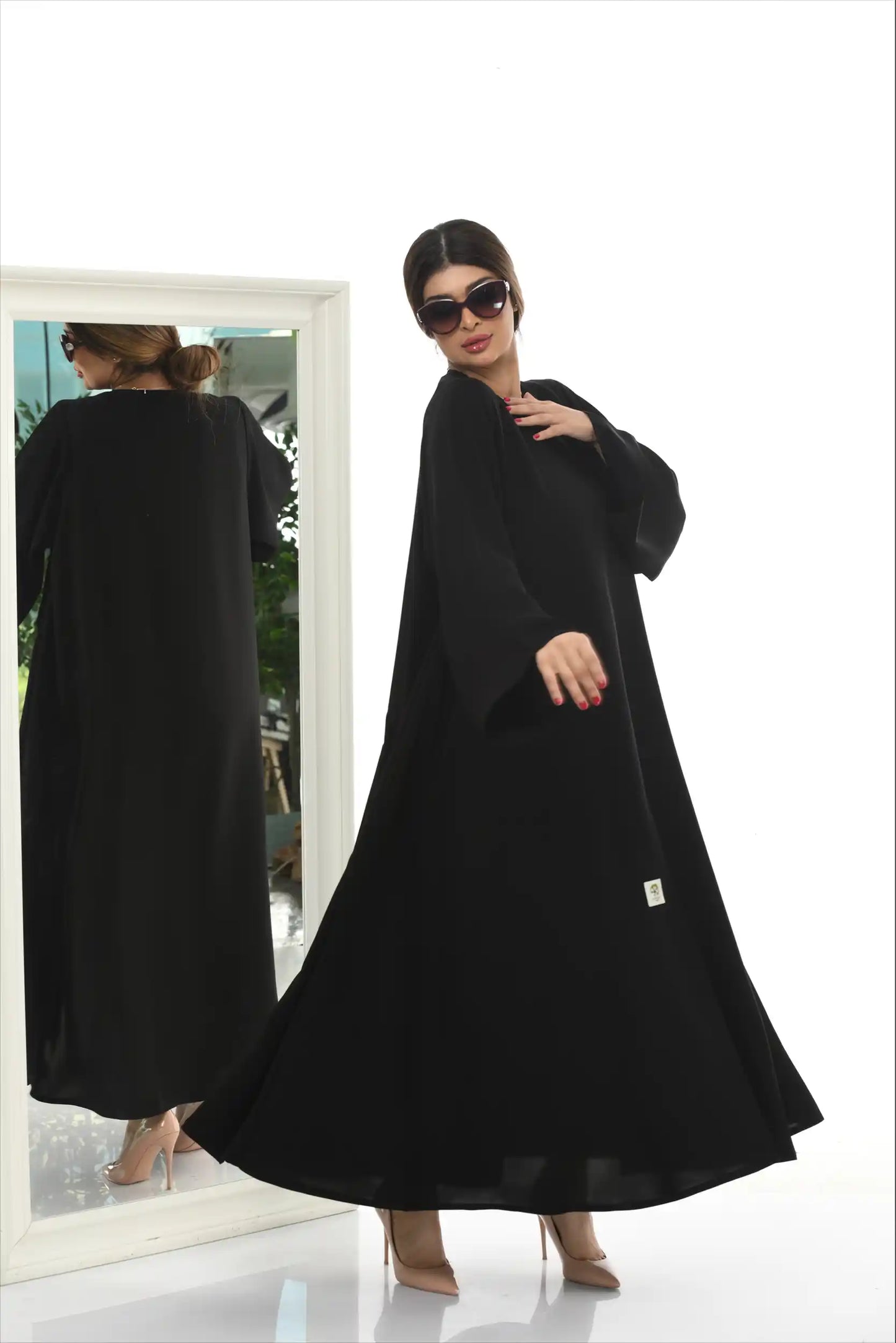 Side view of Arabic Style Plain Abaya in premium Nida fabric, showcasing modest everyday wear for women.
