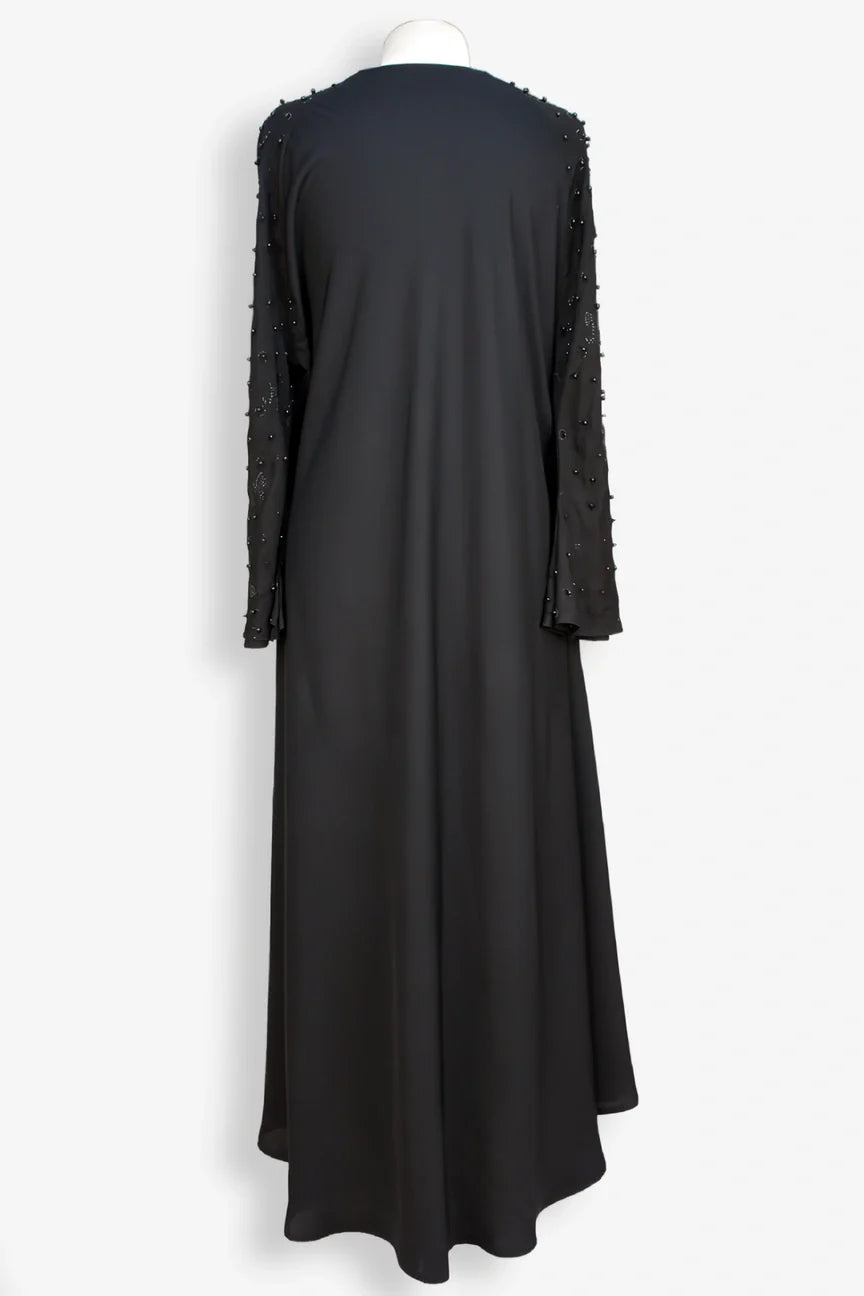 Elegant side view of black pearl abaya decorated with 1600 moti work, modern modest wear abaya for women in Pakistan