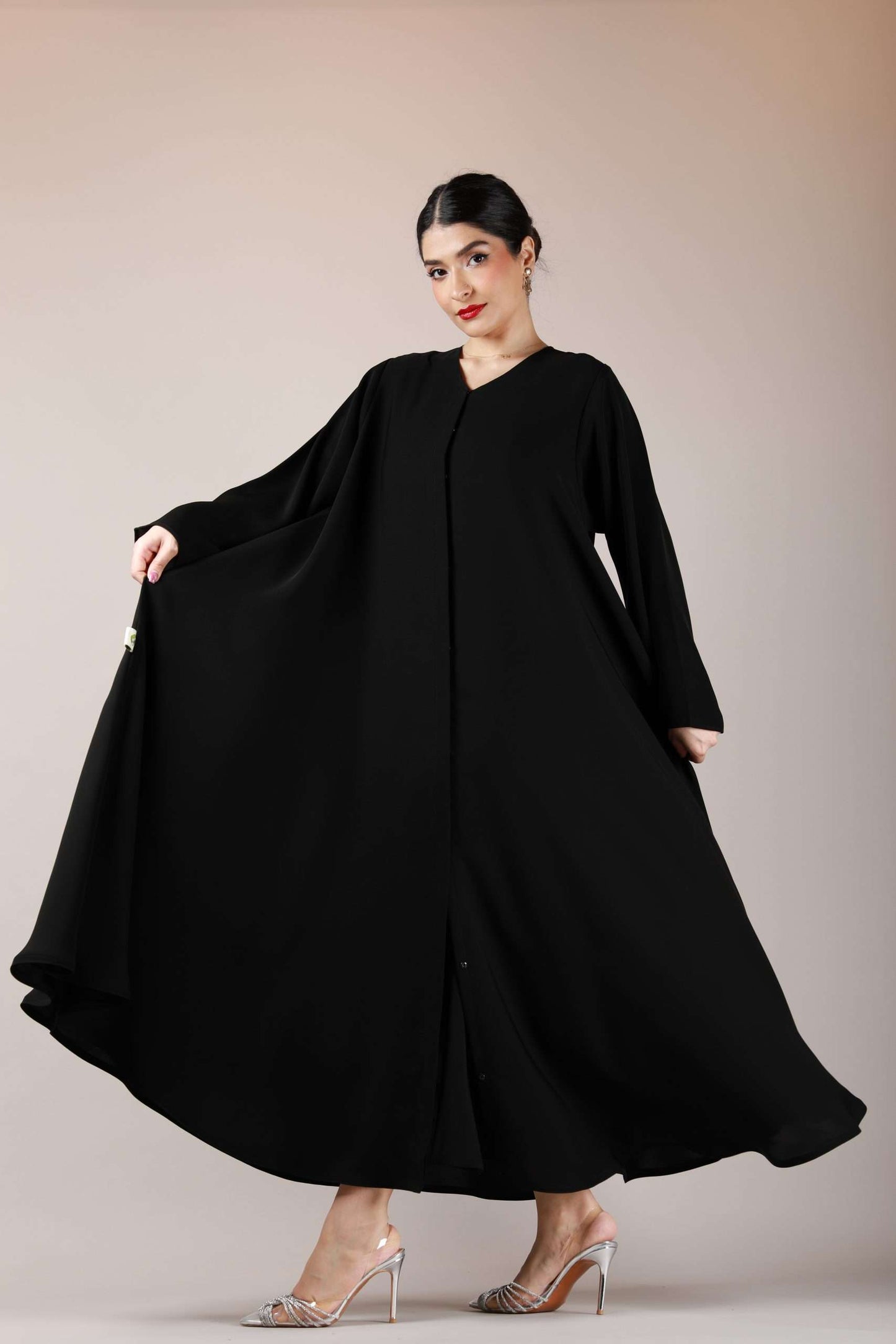 Full front view of Arabic style front open abaya in premium nida fabric, highlighting its modest and graceful look.