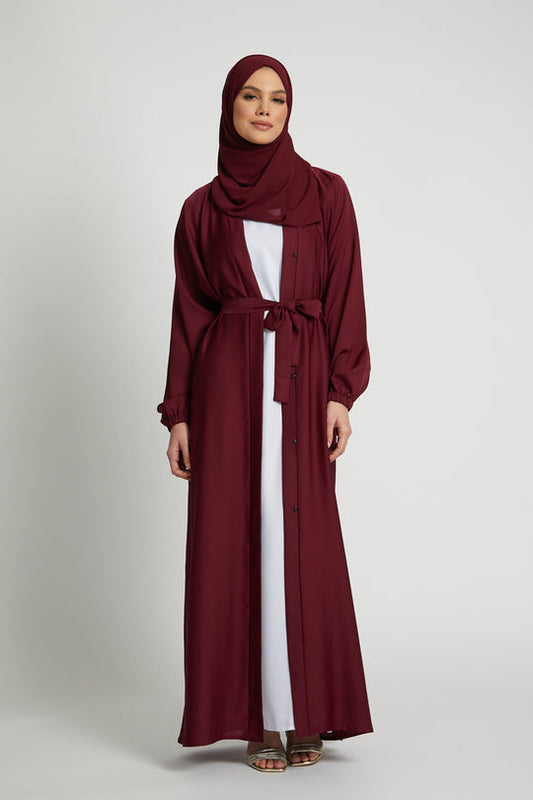 Front view of red abaya kimono with belt tie and cuffed sleeves, modest fashion abaya dress for women