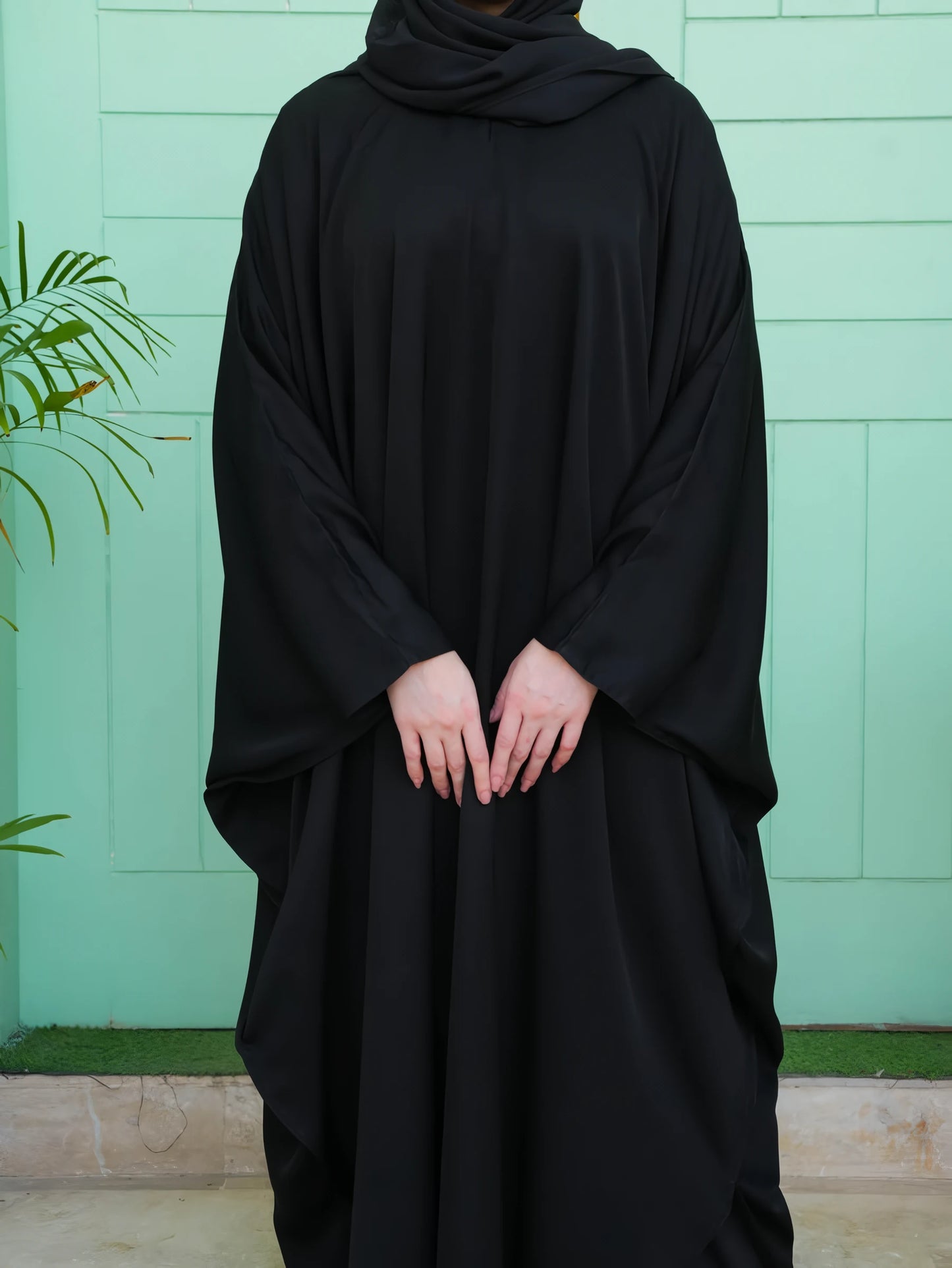 Close-up of Black Premium Kaftan front – revealing the soft Nida fabric texture and fine-quality stitching details.