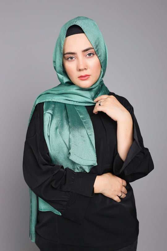 Close-up view of Metallic Chiffon Hijab in Peridot Green showing metallic shimmer and premium chiffon texture