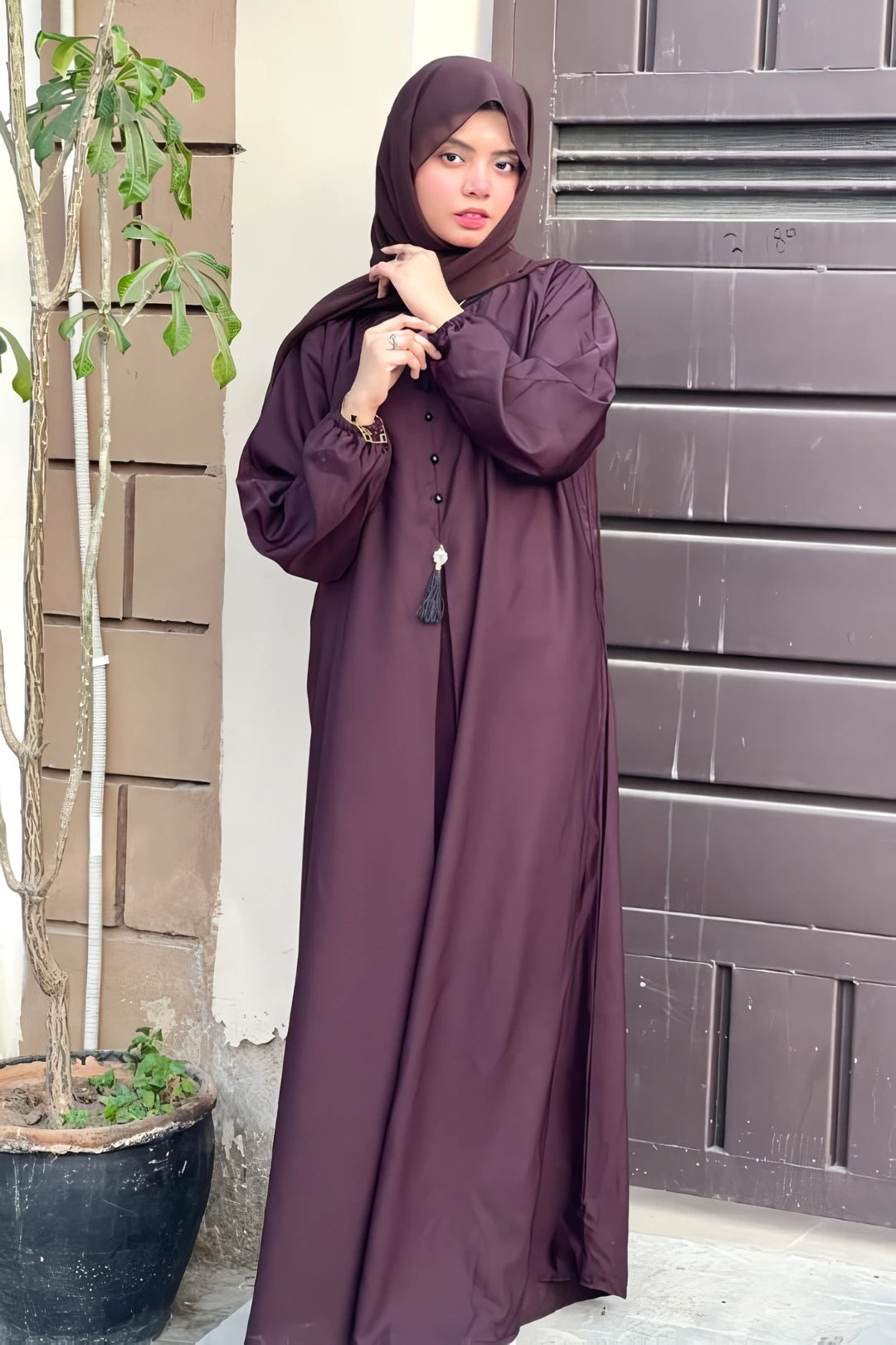 Full-Length View of Elegant Dark Brown Front Close Abaya for Women