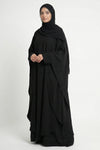 Halimah butterfly abaya for women in black color front full view worn by model showing flowing double layer chiffon fabric