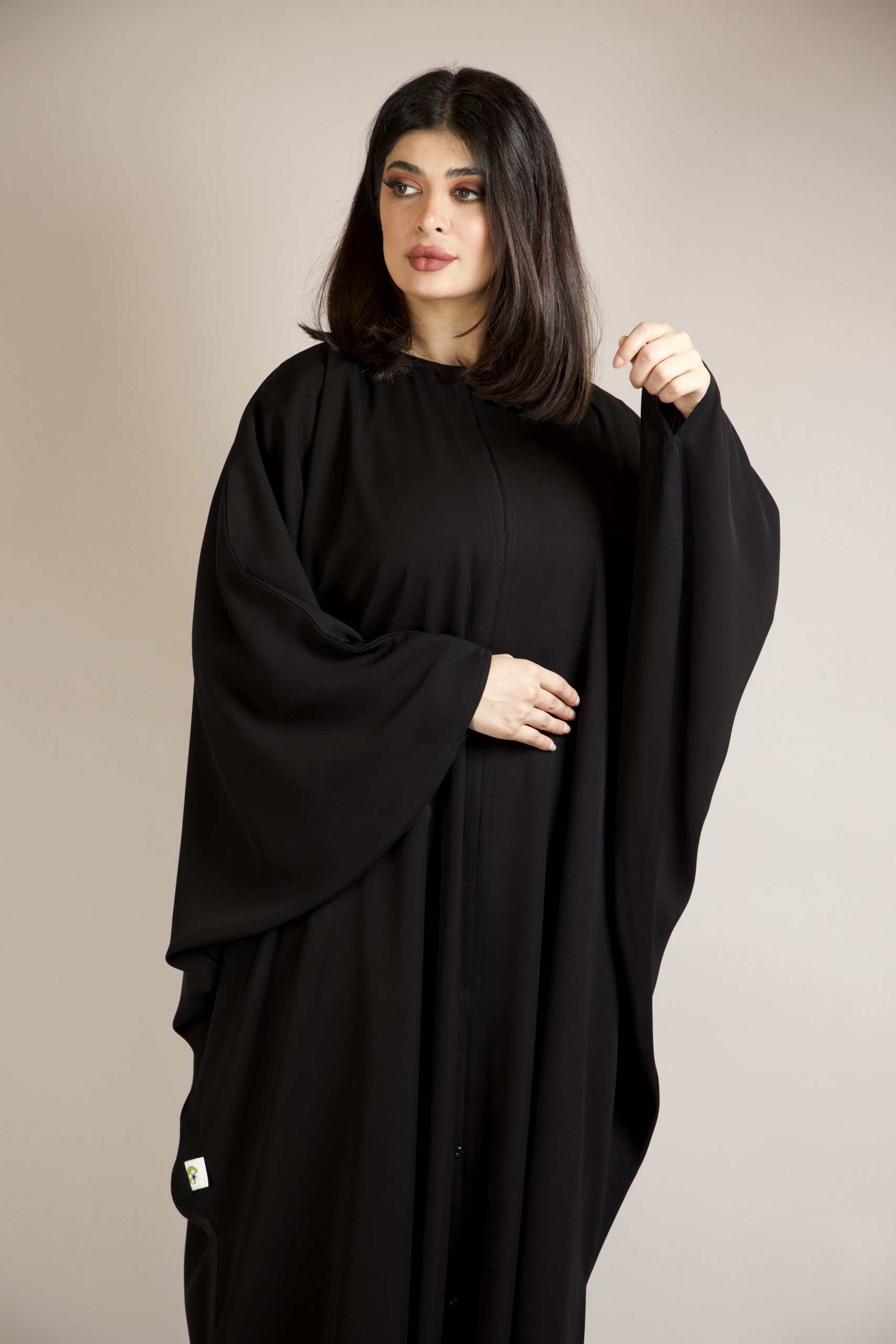 Premium Arabic Kaftan Abaya front look showcasing elegant flow and modest fashion.