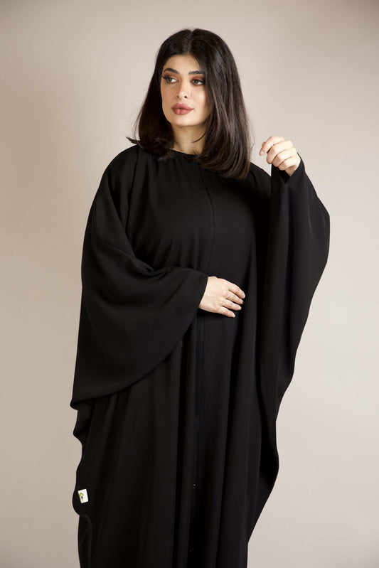 Premium Arabic Kaftan Abaya front look showcasing elegant flow and modest fashion.