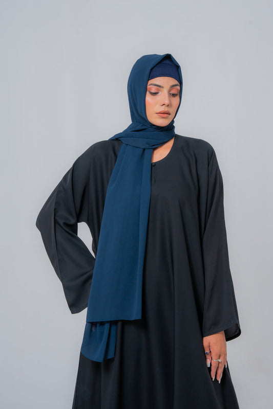 Side angle of Basic Simple Black Abaya highlighting flowy and modest design