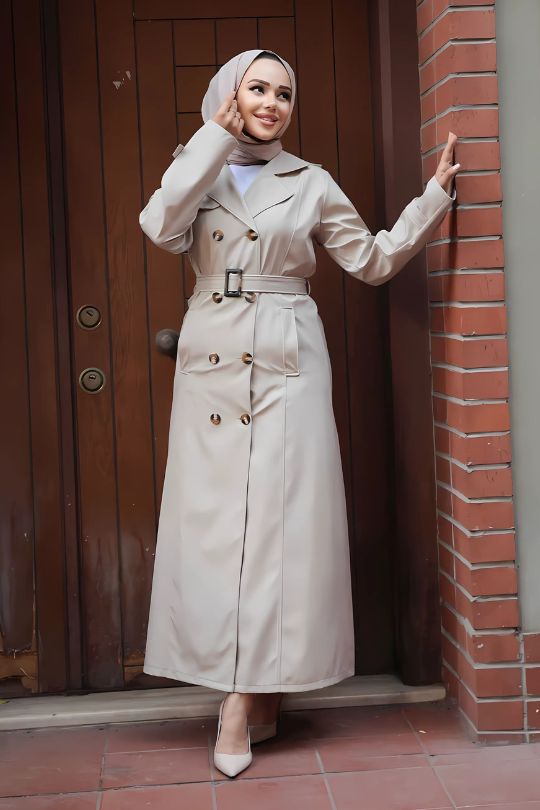 Women’s beige Turkish trench coat side view showcasing modest fit