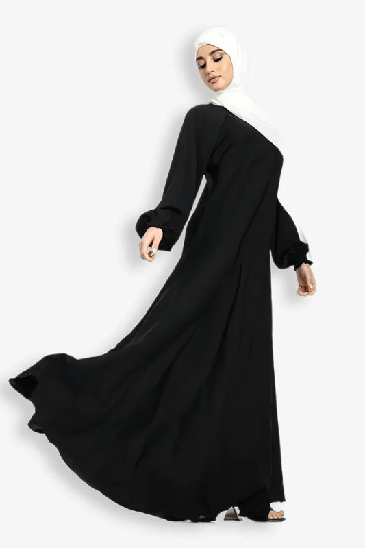 Full front view of stylish plain black umbrella abaya with wide bottom gair design, elegant modest abaya for women