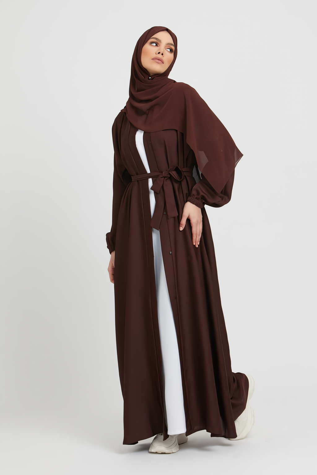 Full front view of brown kimono abaya with white inner slip dress and elasticated cuffs, elegant modest abaya for women in Pakistan