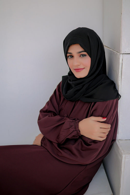 Zoom-in showing fabric texture and multi color design on front closed button abaya, stylish abaya for women, online abaya shopping Pakistan