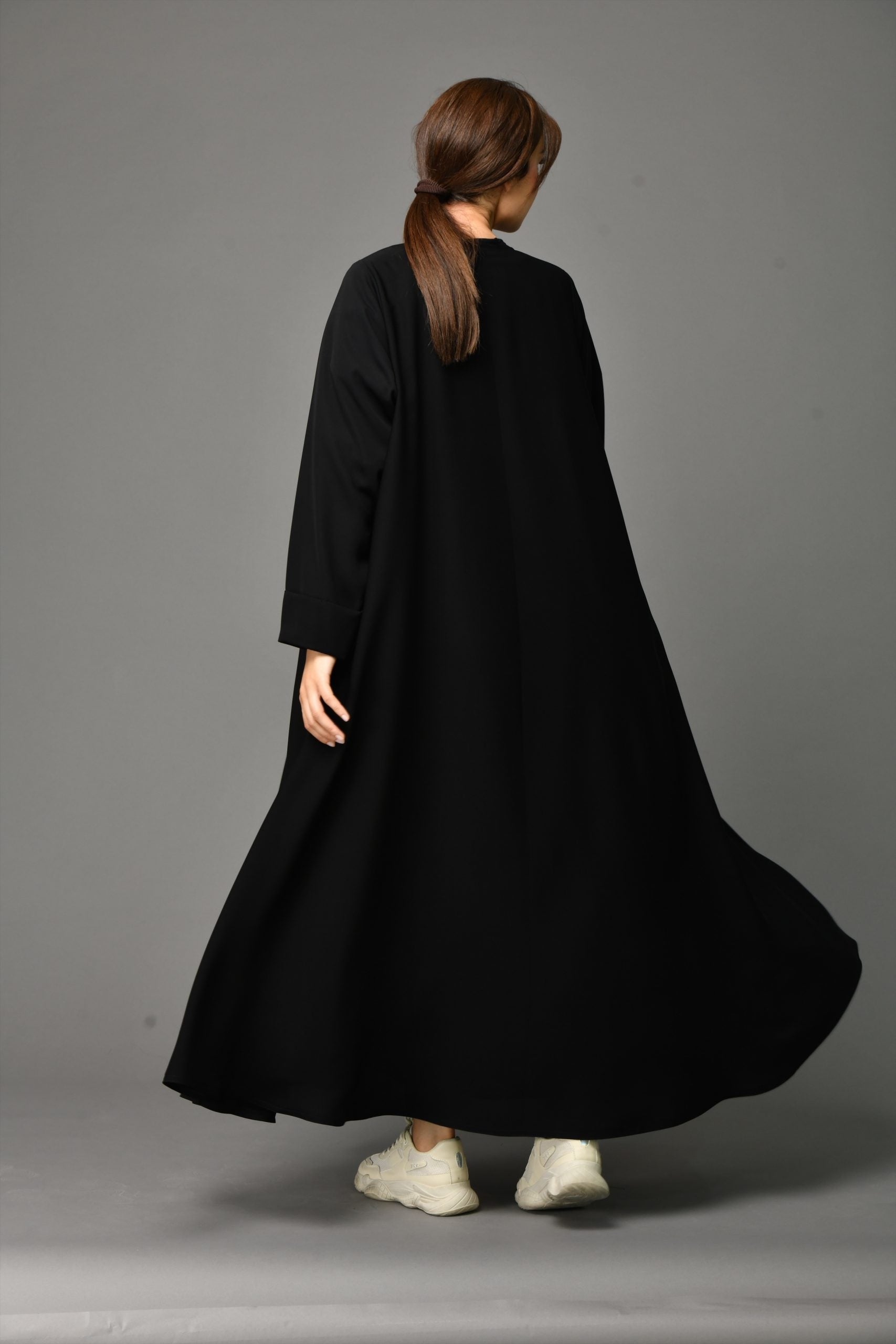 Full backside view of Arabic Style Abaya with front close zipper design, crafted from premium nida fabric.