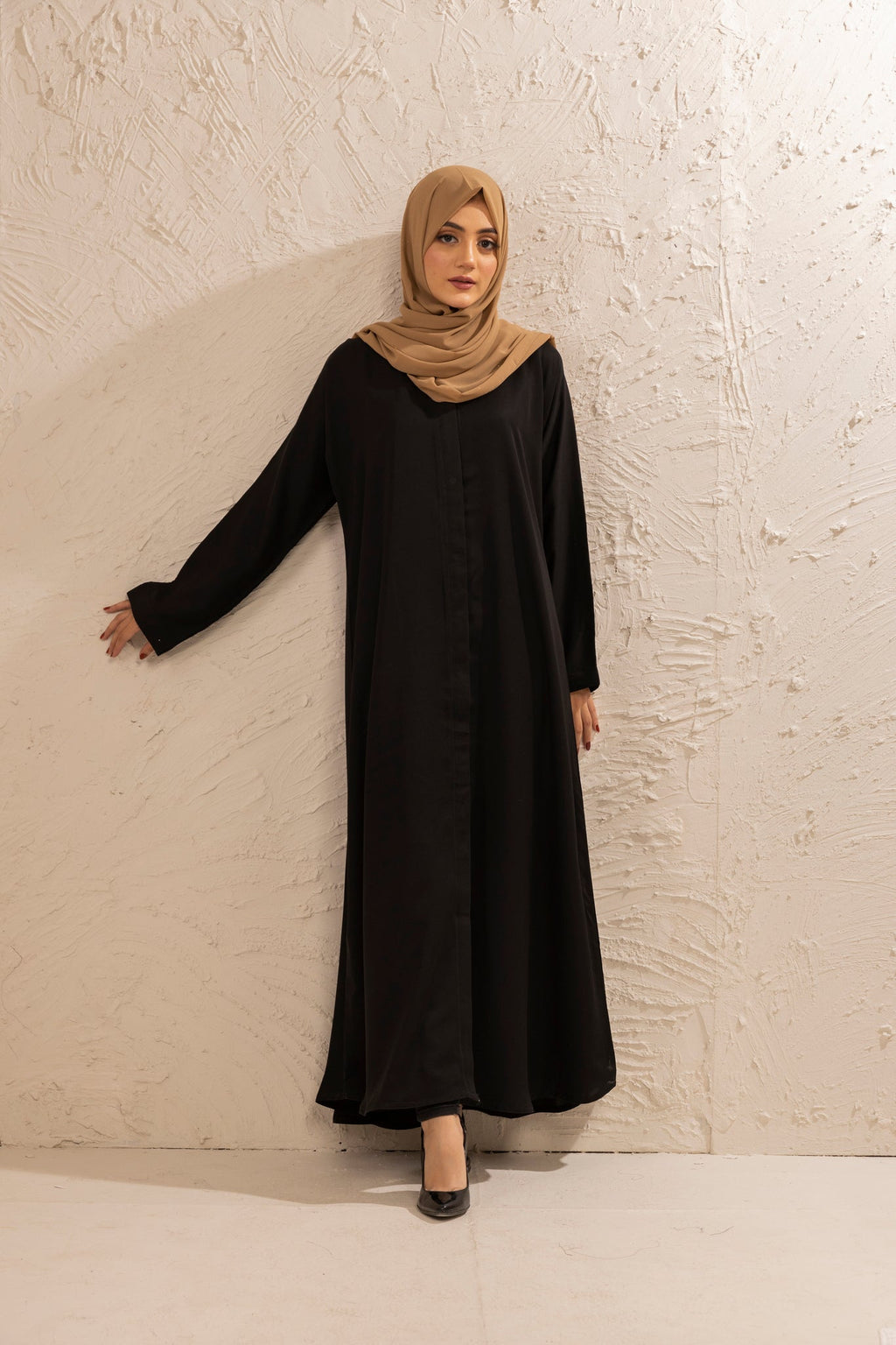 Simple black abaya in open style, front view showcasing elegant modest outfit for women in Pakistan