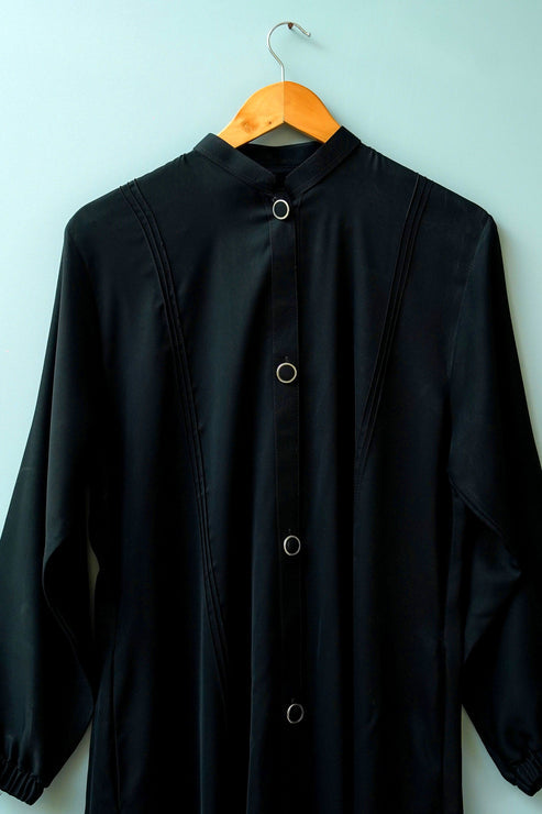 Close-up of coat style front design on Turkish abaya, elegant modest abaya for women, online shopping Pakistan
