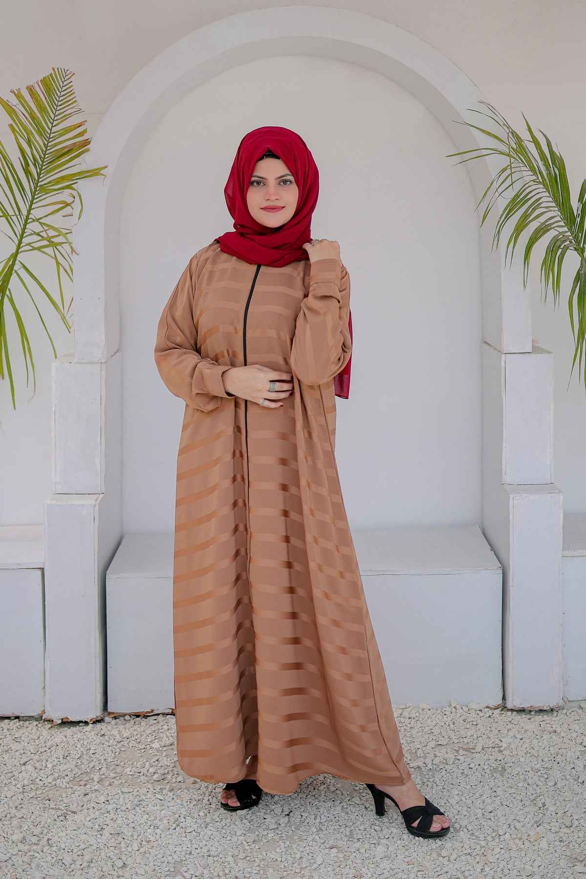 Beige front open zipper abaya full view showcasing modest fashion design