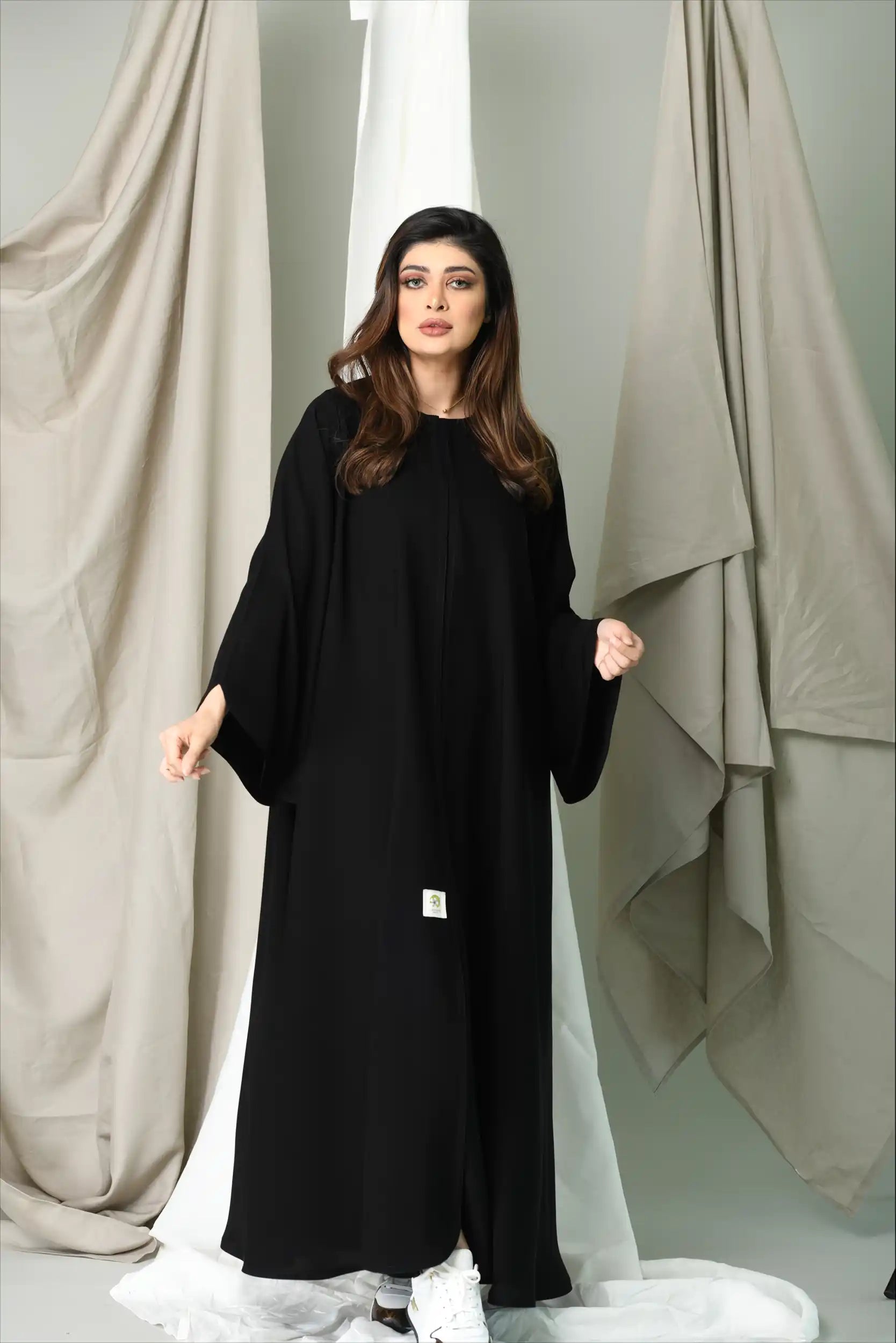 Front view of Premium Closh Cut Practical Abaya with front close design and optional full layer showcasing modest elegance for women.