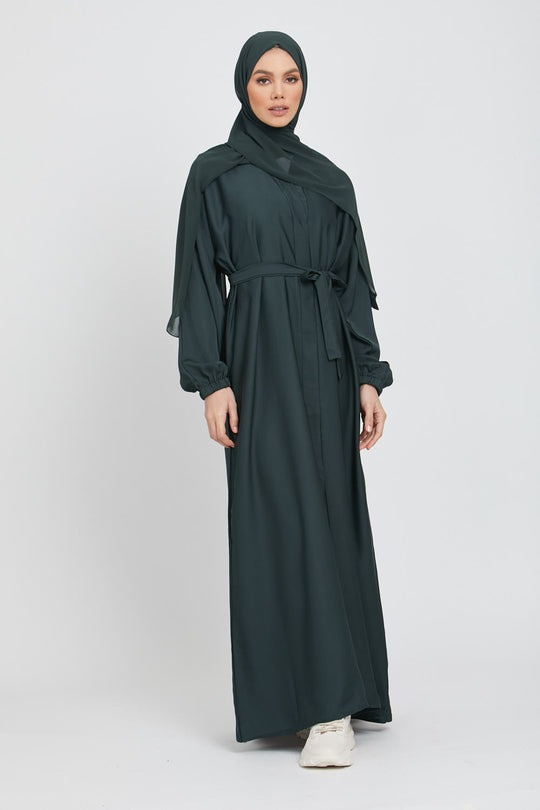 Elegant front view of green kimono style abaya with white inner slip, fashionable modest wear for women in Pakistan