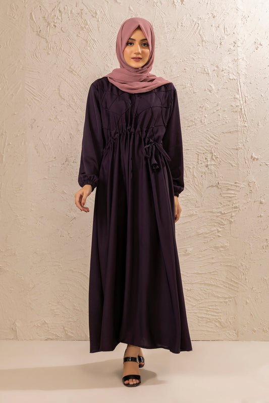 Full front view of half pintex abaya featuring elasticated cuff sleeves and waist belt, elegant modest abaya for women