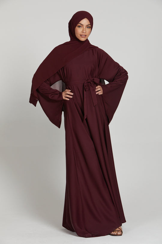 Front full view of maroon simple abaya, long sleeves elegant modest abaya for daily and formal wear