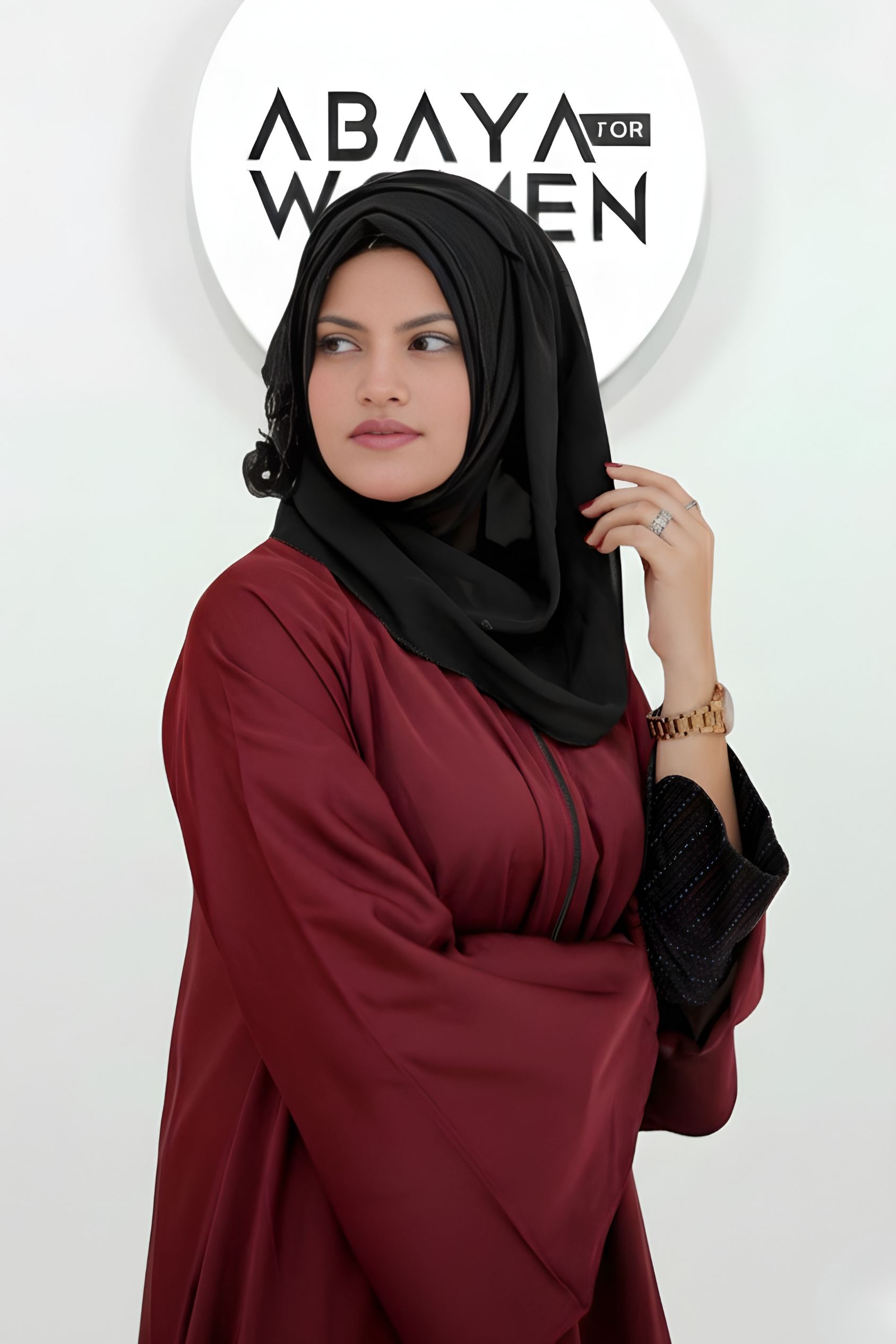 Close up front zipper detail of maroon front open abaya for women