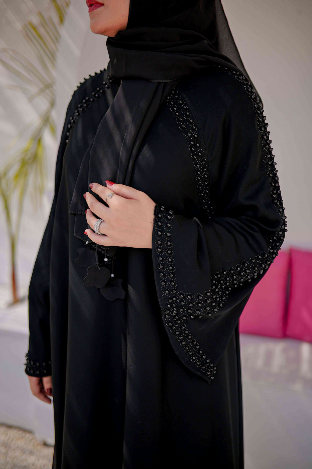 Side angle of stylish Moti Work Abaya with Round Nugs highlighting intricate beadwork, elegant flow, and modest fashion style