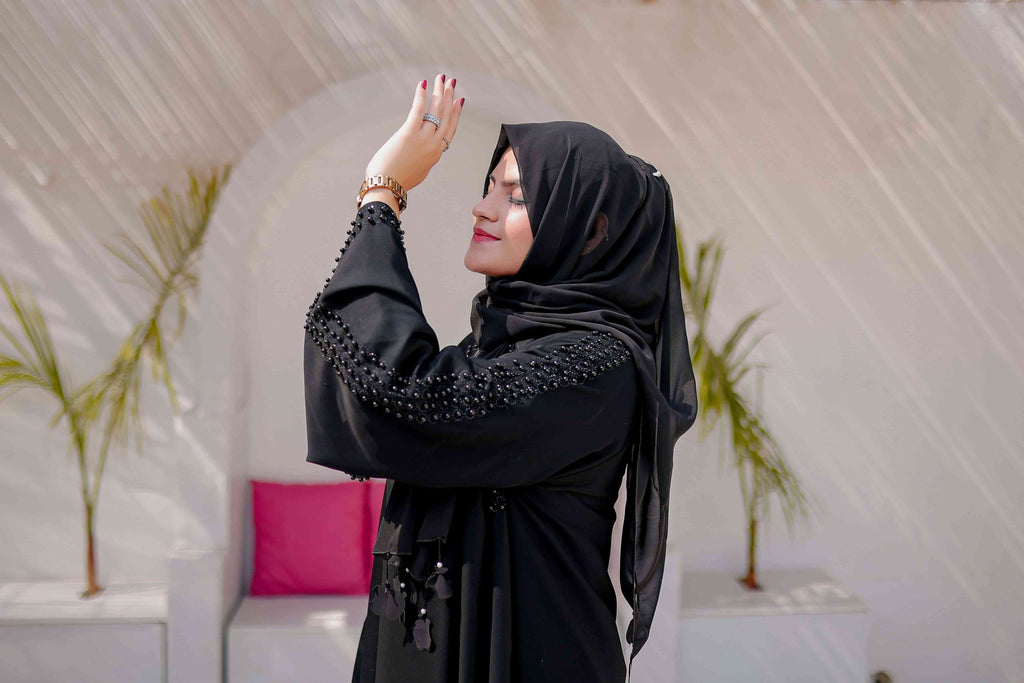Side zoom-in of Moti Work Abaya with Round Nugs highlighting intricate moti beadwork, fine stitching, and elegant nida fabric for modest women’s fashion