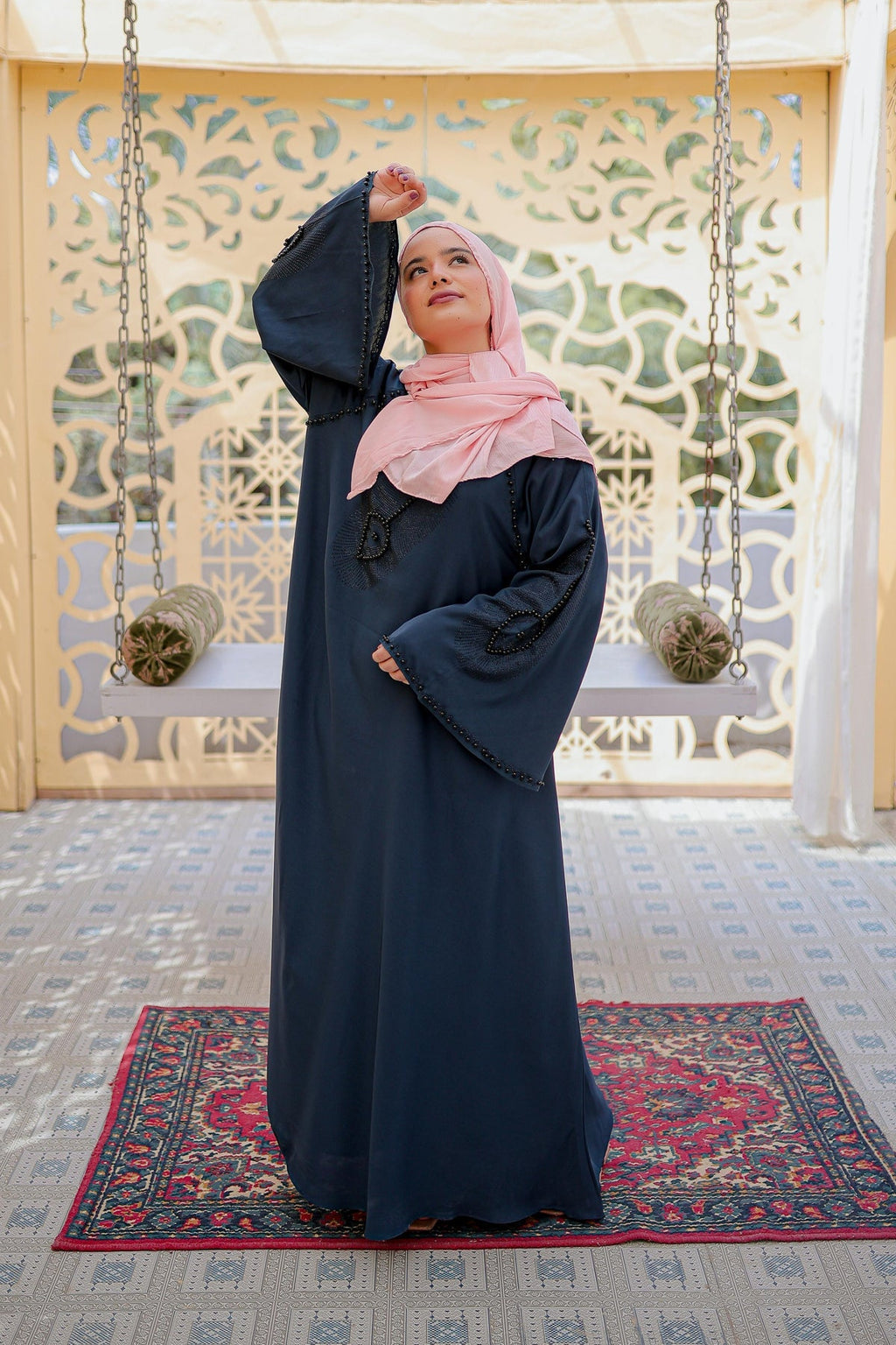 Stylish white abaya with nug and moti work on neck and sleeves, full front view, modest wear abaya for women in Pakistan