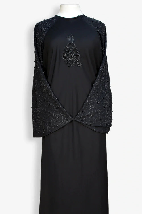 Close-up zoom of pearl sleeve embellishment with 800 moti work on black abaya, stylish modest abaya design for women, online shopping Pakistan