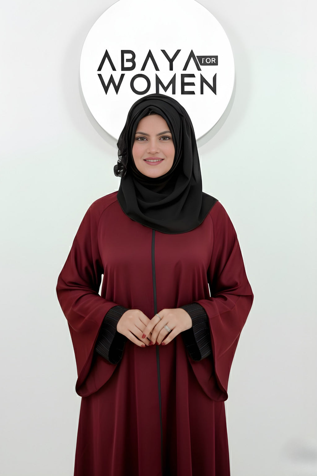 Premium fabric and fine stitching front detail of maroon front open zipper abaya