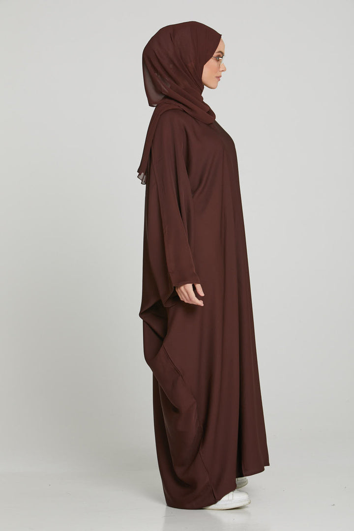 Side full view of dark brown butterfly kaftan abaya, stylish modest outfit for women in Pakistan