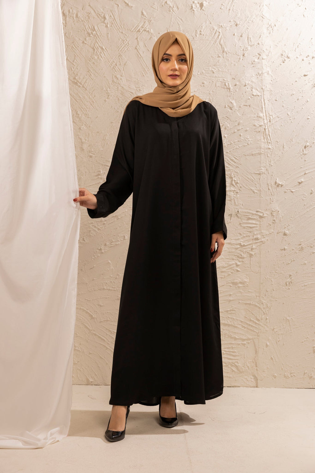 Front full view of stylish black open abaya, comfortable modest wear for women, abaya online shopping Pakistan