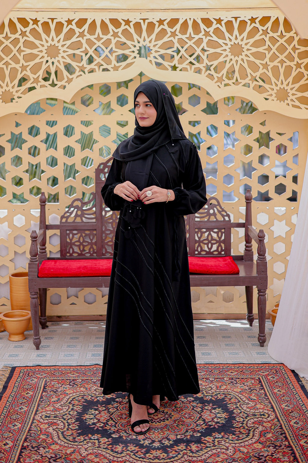 Modern pintax abaya featuring front zipper and elastic cuff sleeves, side view, stylish modest abaya for women, online abaya shopping Pakistan