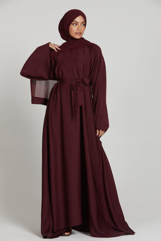 Full front view of maroon long sleeve abaya, modern modest wear abaya dress for women in Pakistan