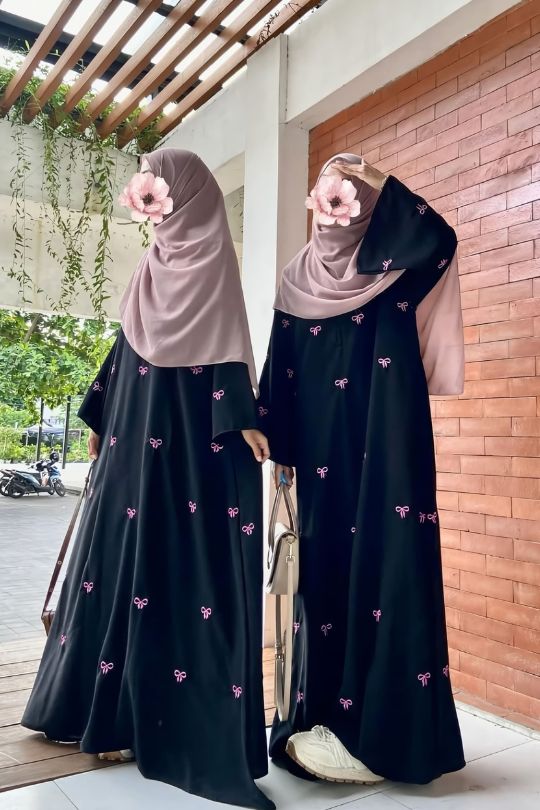 Back view of Trendy Bow Maxi Abaya featuring modest full coverage and chic bow style for women