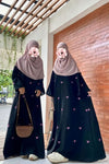 Front view of Trendy Bow Maxi Abaya highlighting bow design and elegant full-length modest wear for women