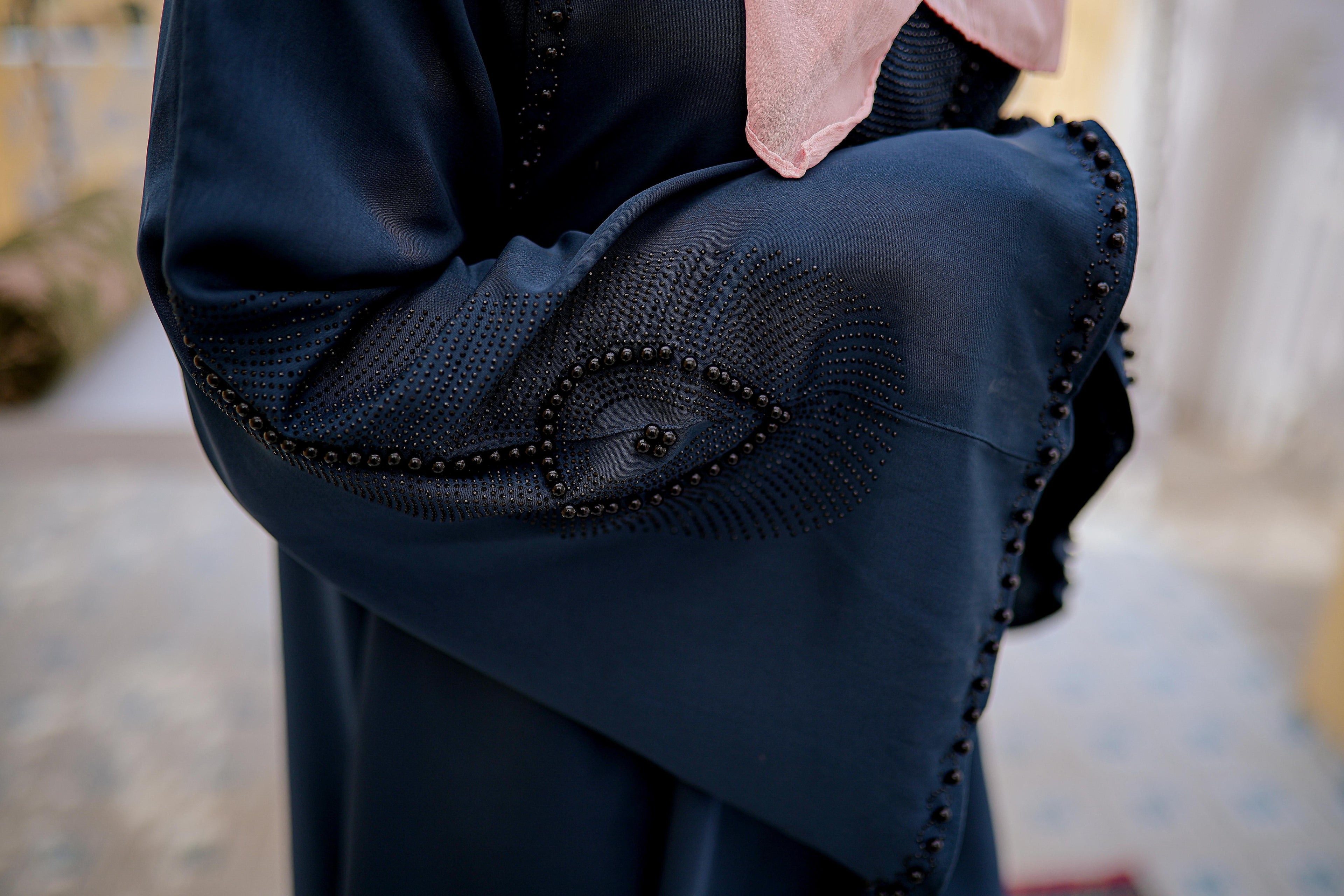 Detailed zoom-in of nug and moti work on abaya sleeves, elegant modest abaya for women, online abaya shopping Pakistan