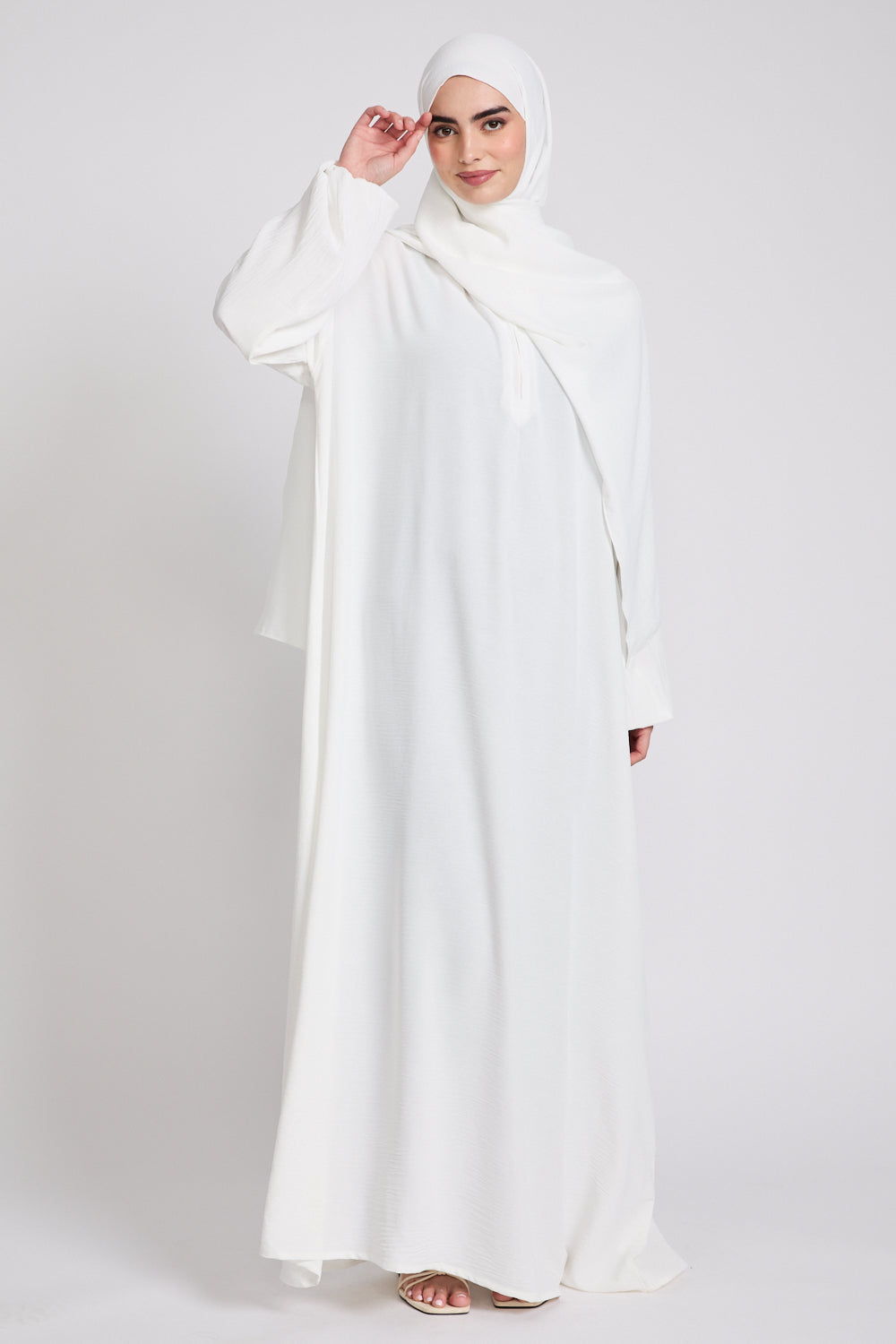 Back view of White Closed Abaya with Front Zip highlighting full-length coverage and graceful modest wear design