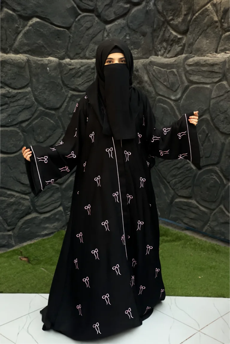 Front full silhouette of Black Bow Abaya – lightweight open-front abaya with graceful drape and feminine pink embroidery design.